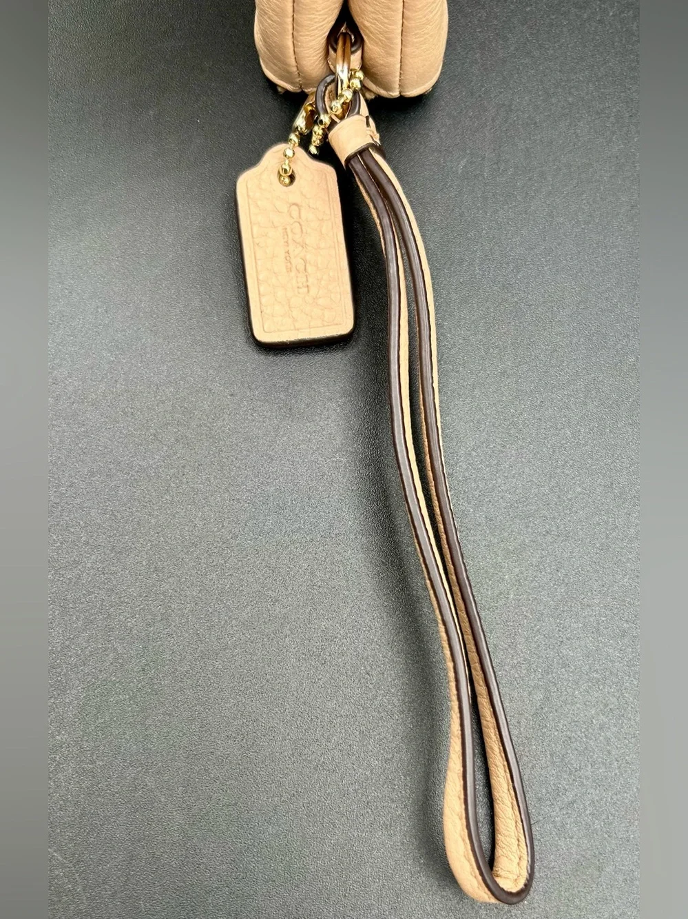 COACH Pebble Leather Double - Zip Wristlet in a neutral tan - Gold-Tone Hardware